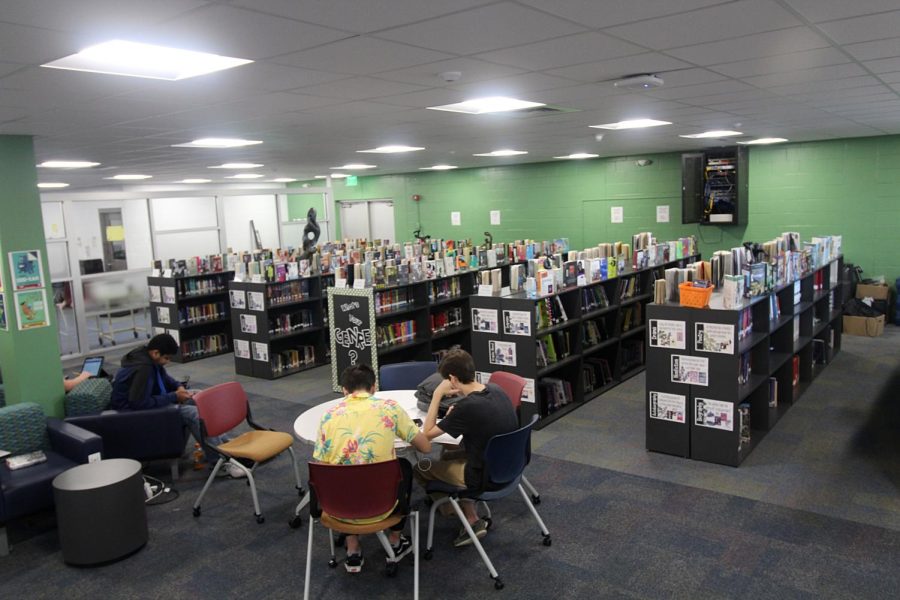 Students+sit+in+the+new+library+section+in+the+media+center+on+Oct+4%2C+2019.