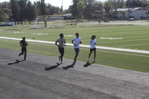 Lakewood students run after school during track practice in January.