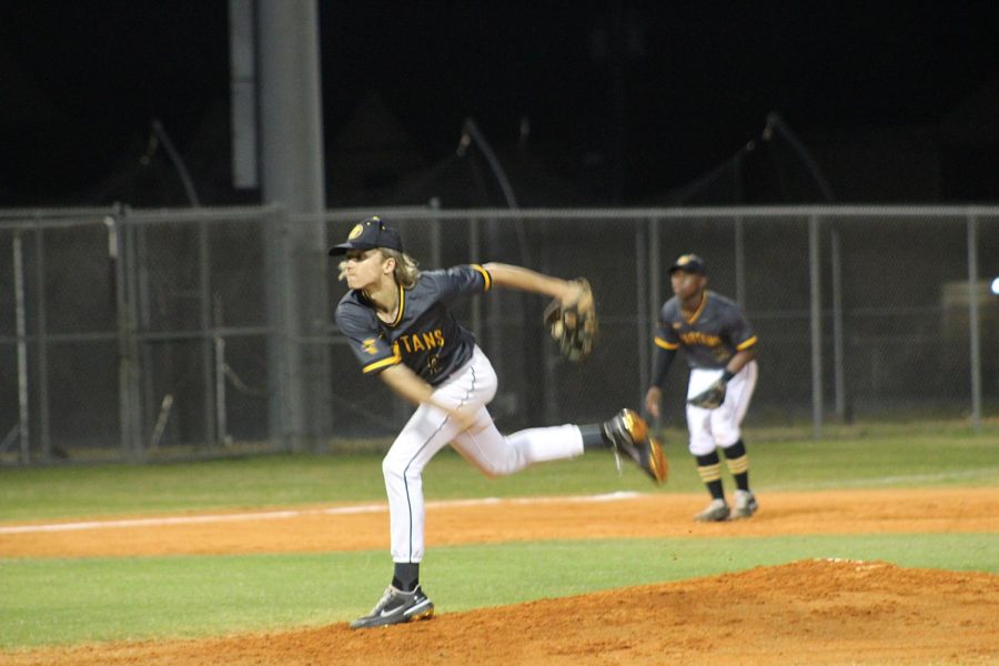 Sophomore Beau Brightman pitches to a Largo High batter on Feb 25 at Largo. Spartans won 8-5.