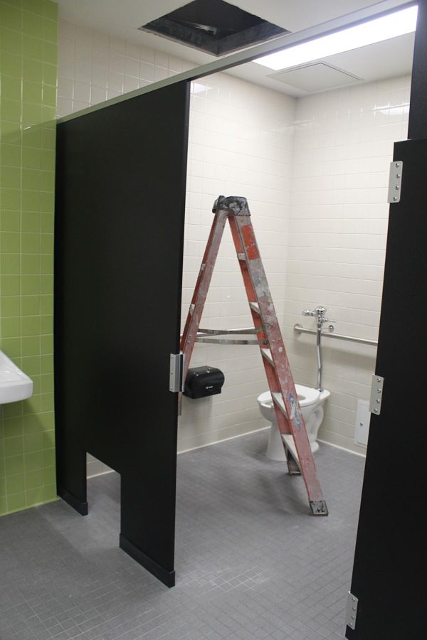 A ladder stands in a stall in the girls bathroom in B-wing in early April.