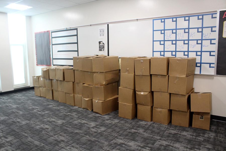 Moving boxes are stacked against a wall in a newly renovated B-wing classroom in early April.