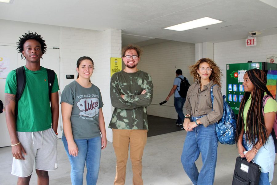 From left to right Seniors Davian Richards, Katelyn Barnes, Angel Anderson, Giselle Galston, and Junior Chanel Williams all pose for a photo at Lakewood high school on Sept. 21. These five students are wearing green for the SAVE Promise clubs Say Hello Week. This week is meant for building connections, putting a stop to bullying, and ultimately building a community. 
