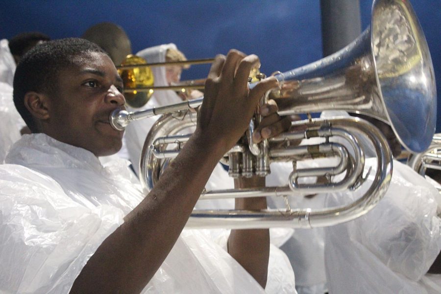 Sophomore Machi Jones plays his baritone during the Northeast game on Aug. 25.