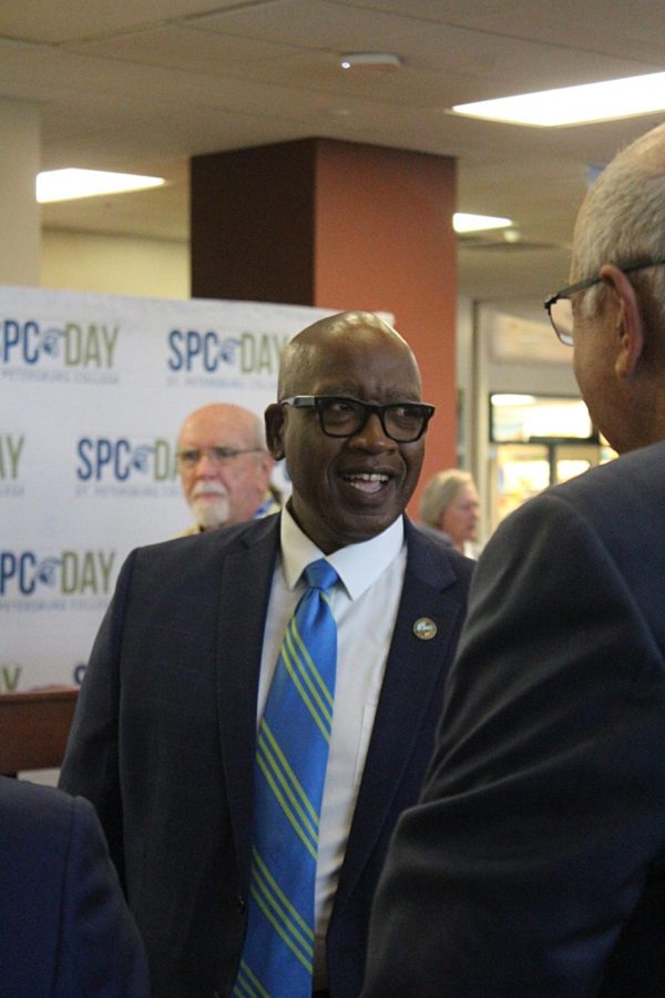 Mayor Ken Welch talks smiles while he talks to some of the crowd before the SPC day speeches start on Sept. 12.