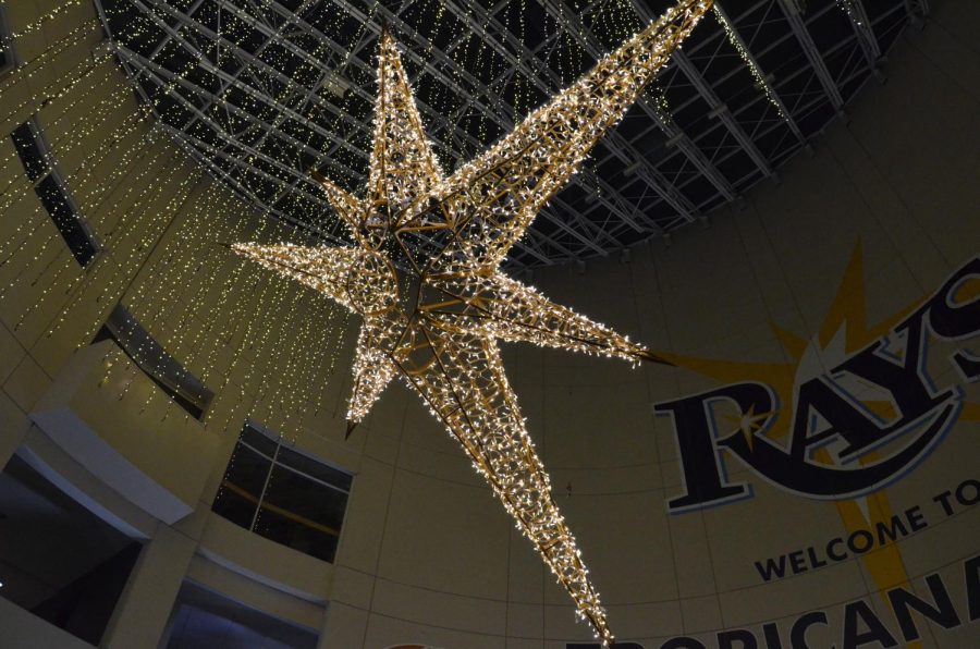 A star hangs down at the enterance of Tropicana Field on Dec. 11. The event is $35 per adult and $25 per child.