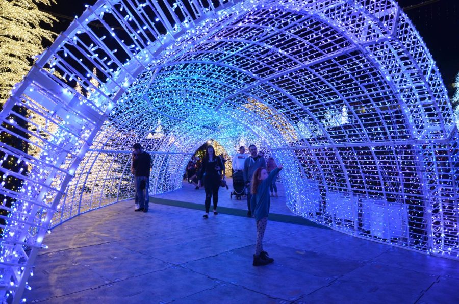 A large light tunnel is one of the many lit structures in the Enchant light display.