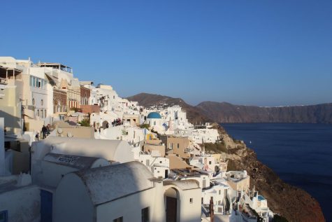 The buildings of Santorini Greece right before a sunset.