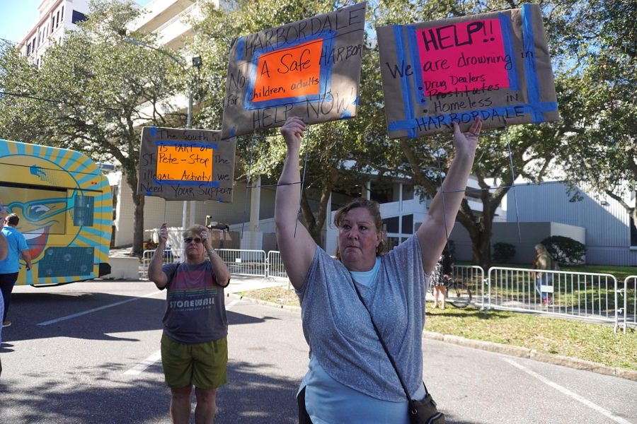 (From right) Protesters Jennifer Wolfe and Susie Posnock from the Harbordale Association protest action to be called in their neighborhood. The government isnt doing anything because its a predominantly black neighborhood, Wolfe said.