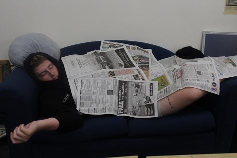 Senior Jonnie Whelan takes a snooze on the journalism couch. Whelan won the senior superlative for Worst case of Senioritis so naturally, he poses as such.