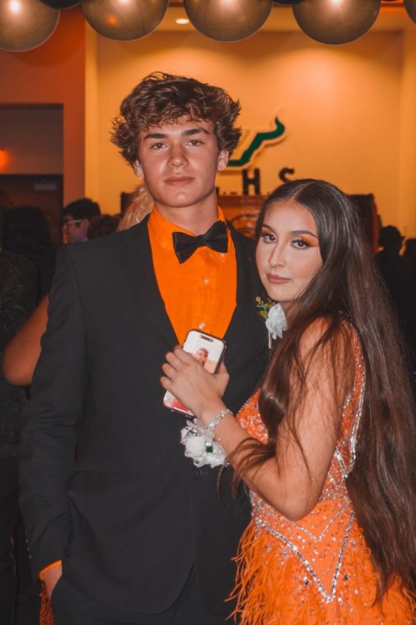 Early+graduate+senior+Destini+Gonzalez+and+her+date+pose+at+the+Lakewood+2023+prom+on+April+8+in+the+USF+ballroom.+