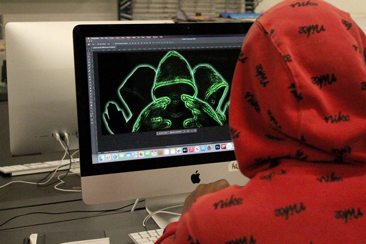 Josiah Lyons works on his digital art project. Students had to create an image in 2D Art.