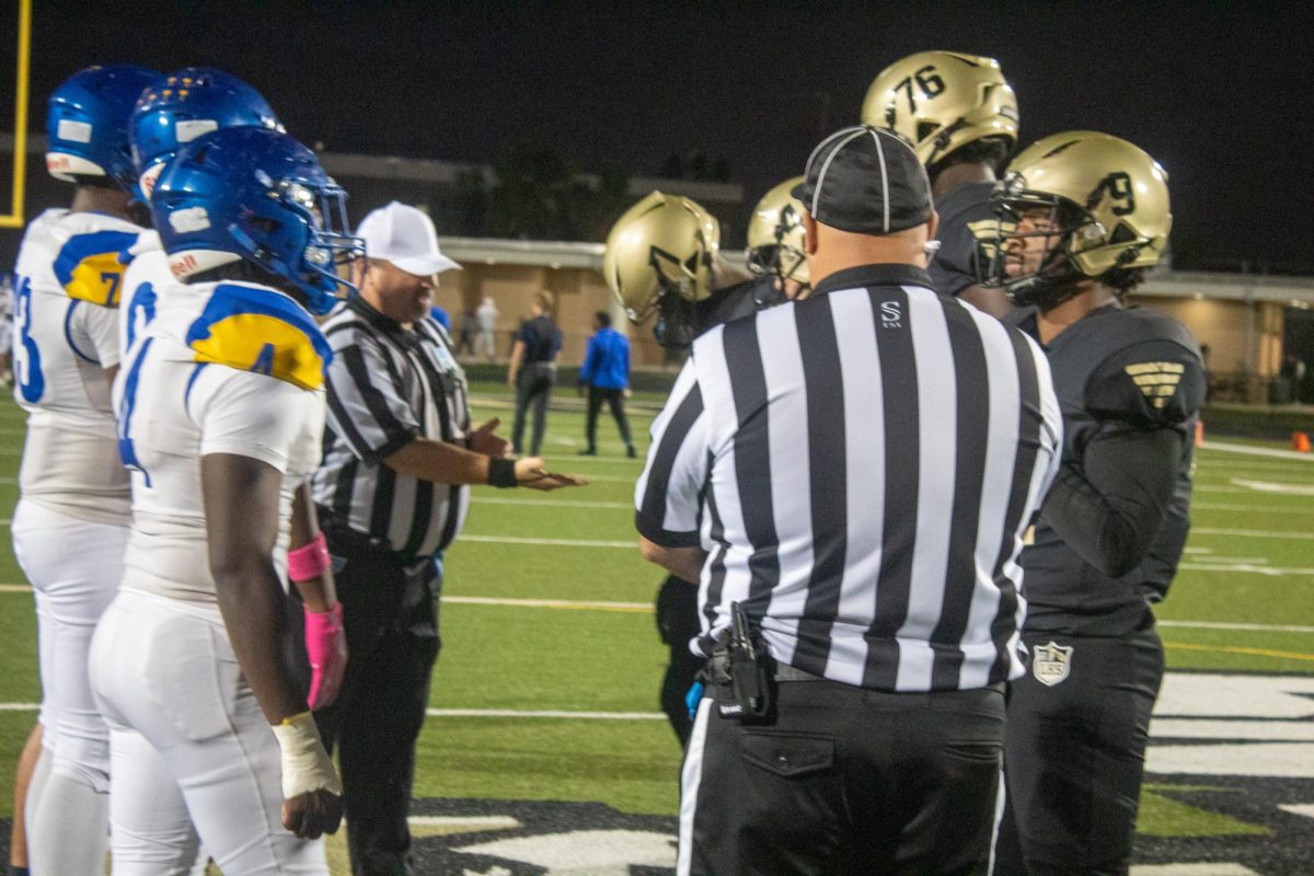 The Lakewood and Gibbs high school football captains go head-to-head with a coin toss.