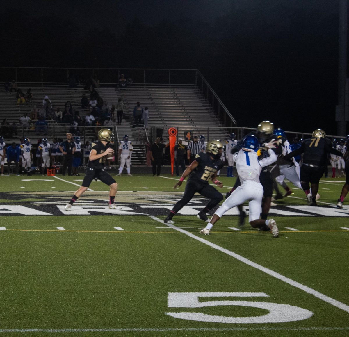 Junior Ayden Wallace makes another play against the gladiators during the senior night game.