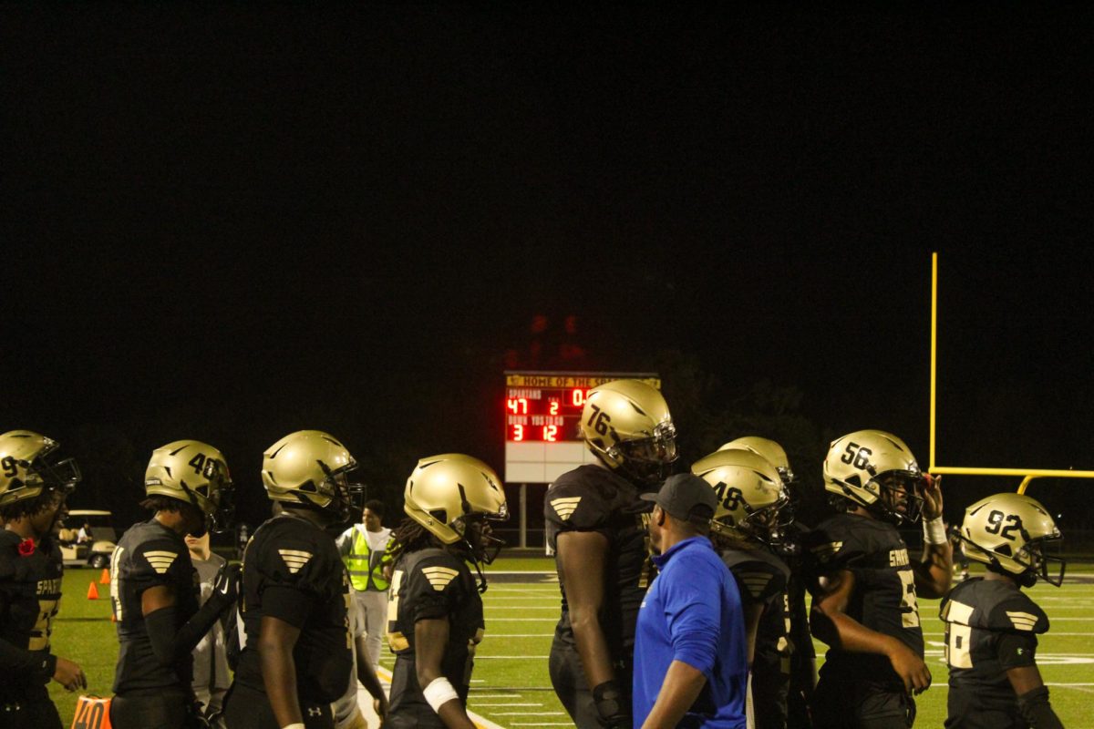 The Spartans show thier sportsmanship towards the Gibbs Gladiators at the end of the game