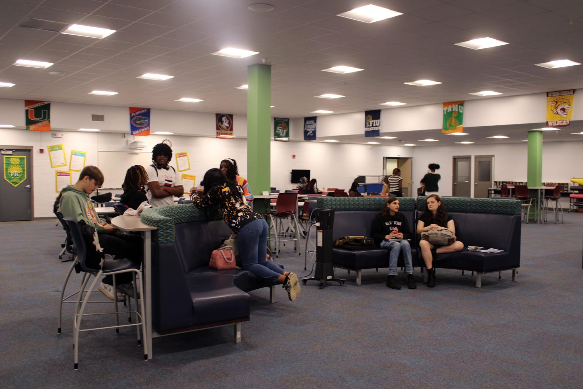 Caption: Spartans of different ages and interests all come to the library to chat and hang out at Lunch Bunch.