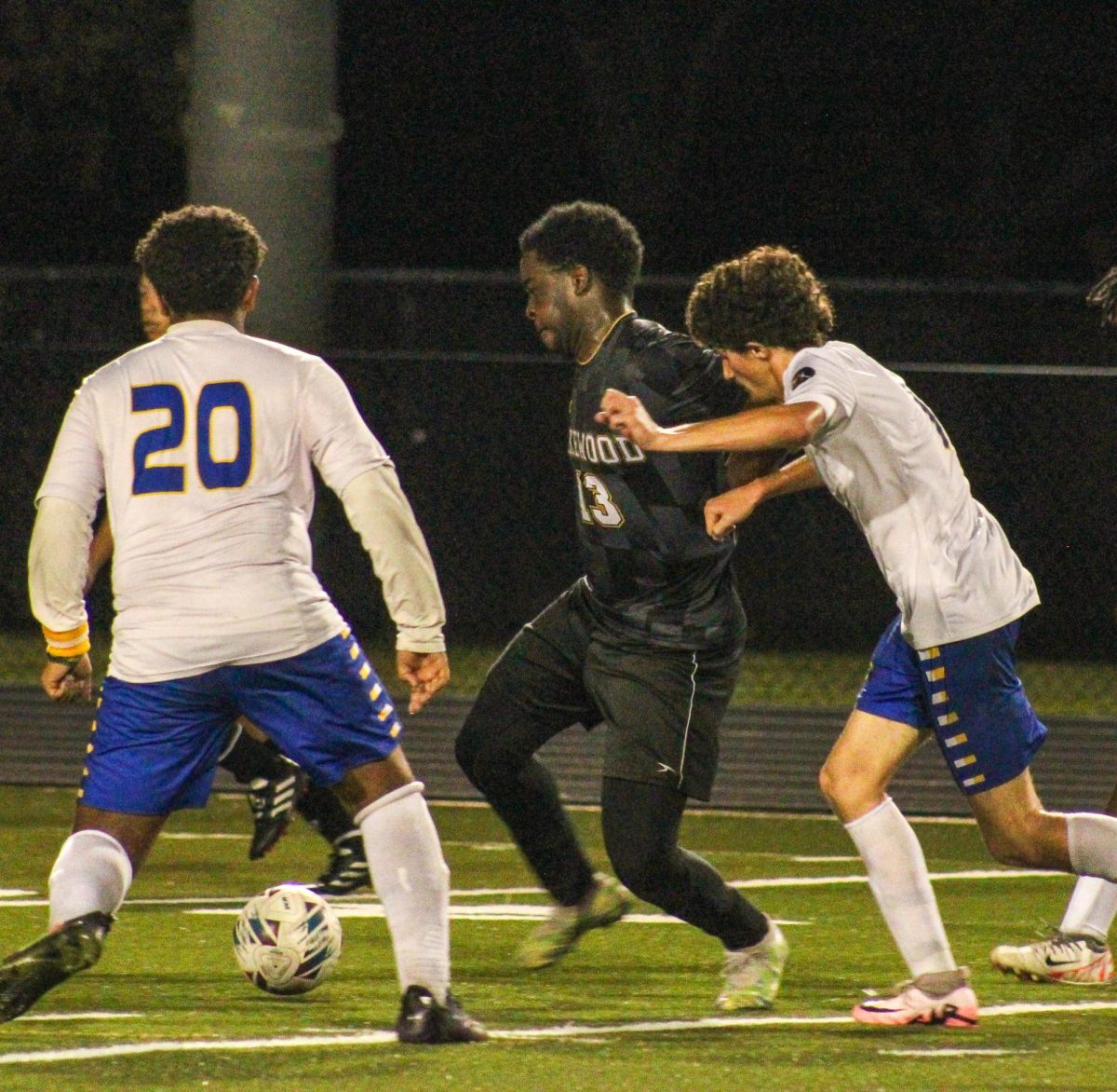 Senior Jeremiah Eustache fiercely passes through every defender getting ready to score. 