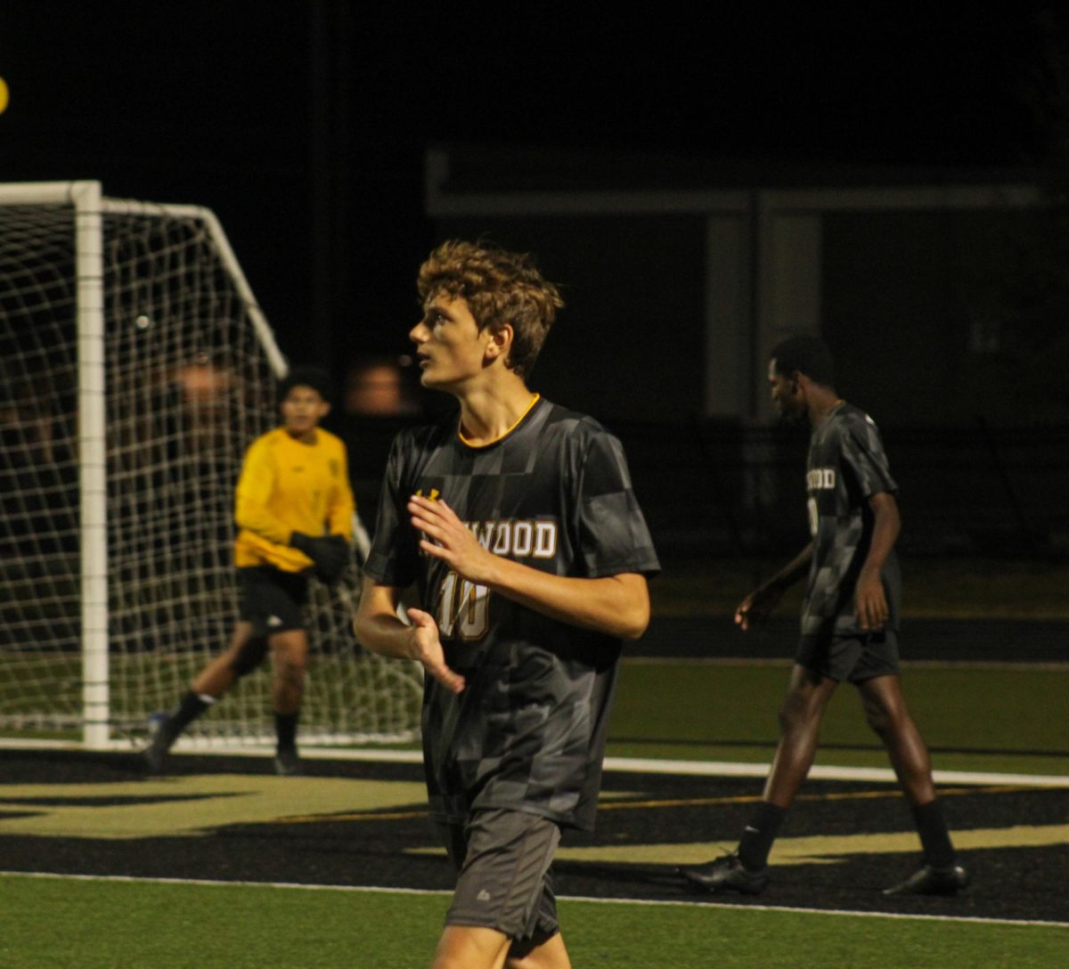 Freshman Parker Sinclair gets ready for the next play during the game.