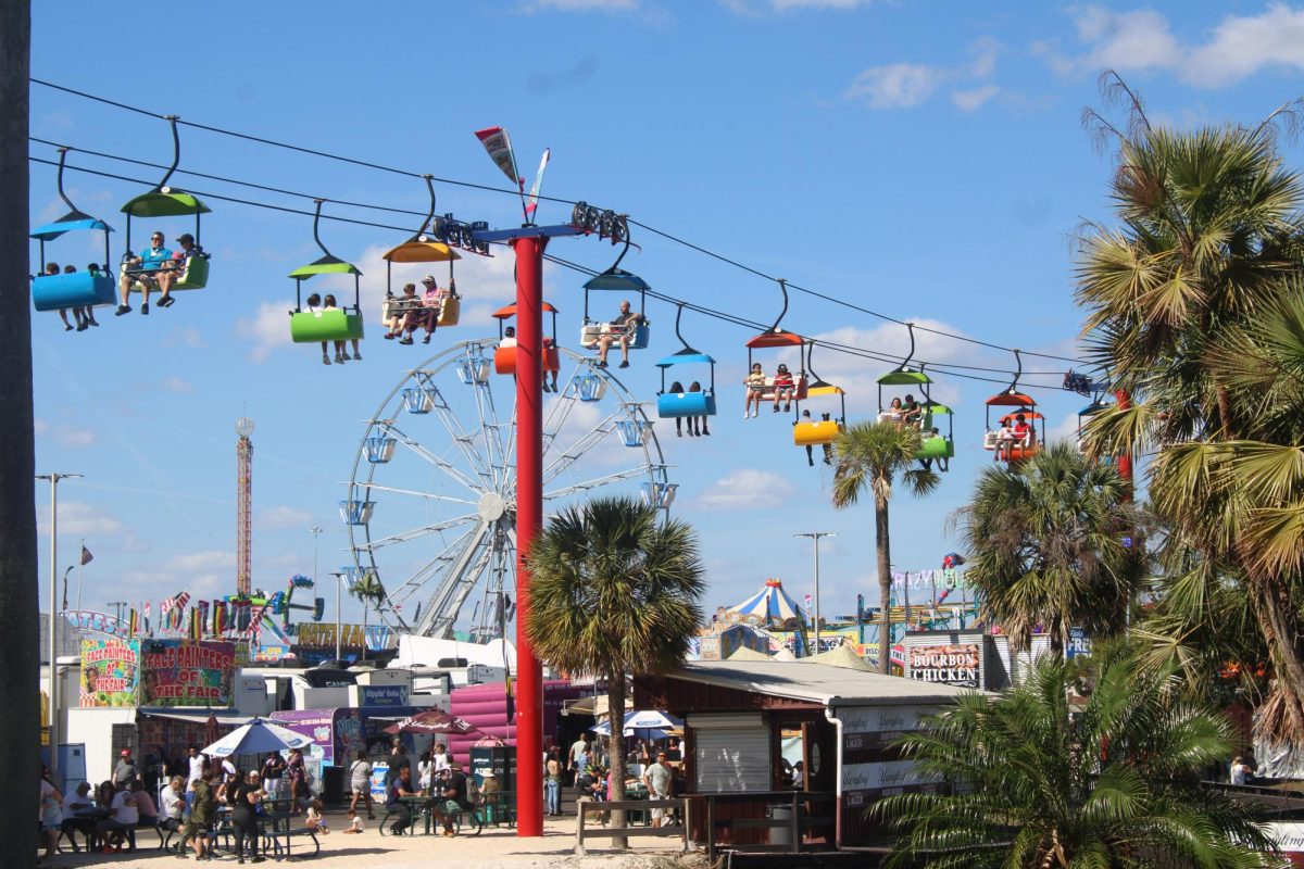 As the wheel comes back down, the fair's Sky-RIde can be seen. Unlike some of the other rides, the lift stays on Florida Fairgrounds year-round.