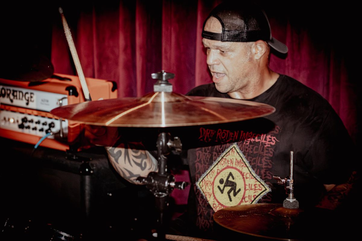 Drummer Adrian Baptist playing with Hardcore Band Flag Burner at Deviant Libation on Aug. 23