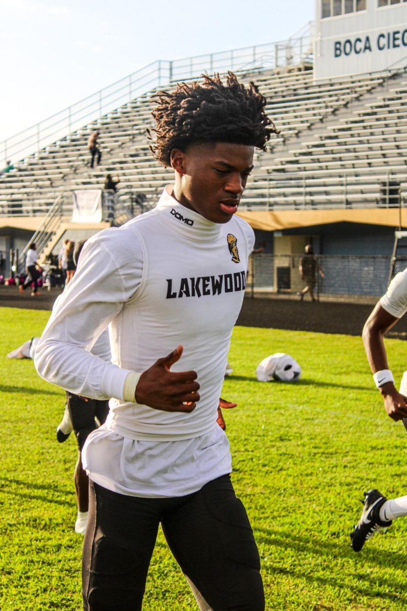 Lakewood High School Wide Reciever Dmari Roberts jogging as a warm up before the Oct.3 game vs. Boca Ciega