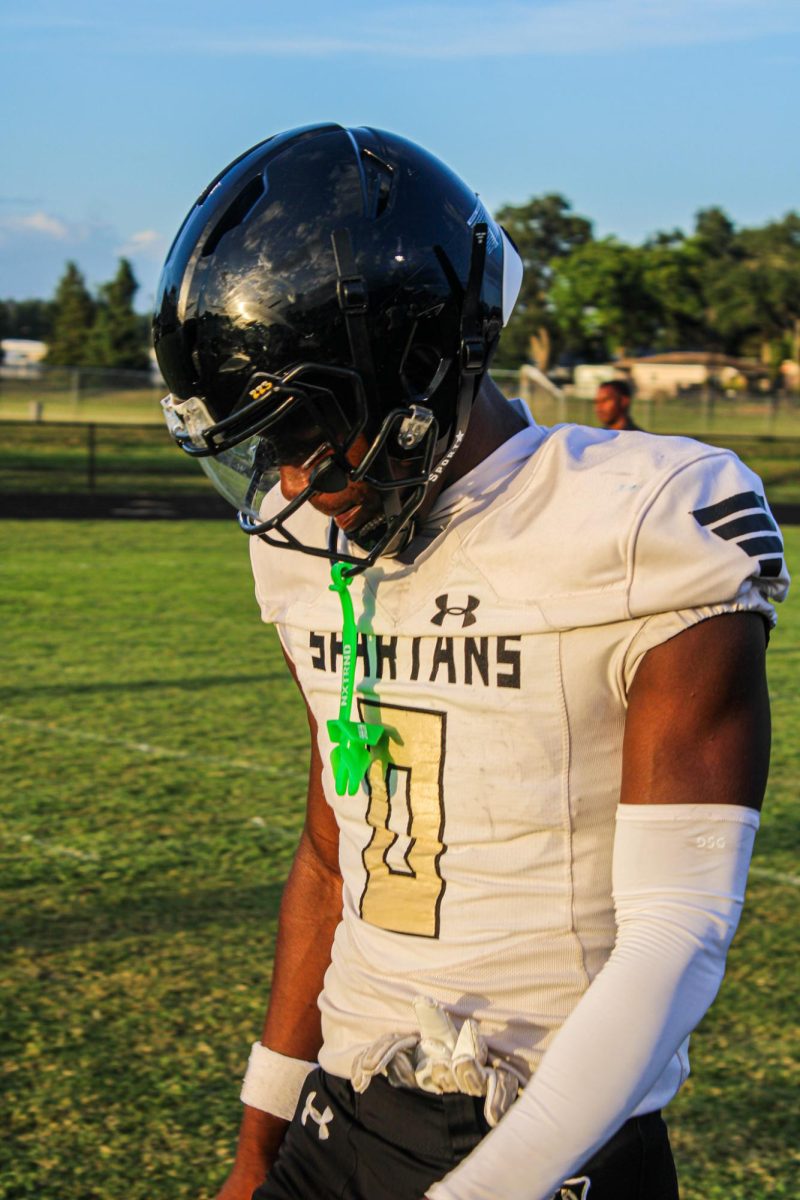 Senior Khalan Davis takes a walk during practice on Oct.3