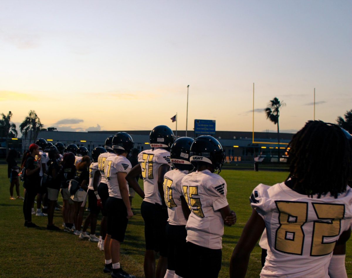 Lakewood Spartans players watch from the sideline as their teammates battle it out under the Friday night lights. The team's focus and energy helped spark a huge second-half comeback at the Lakewood V. Boca Ciega Game on October 2nd at Boca Ciega High School.