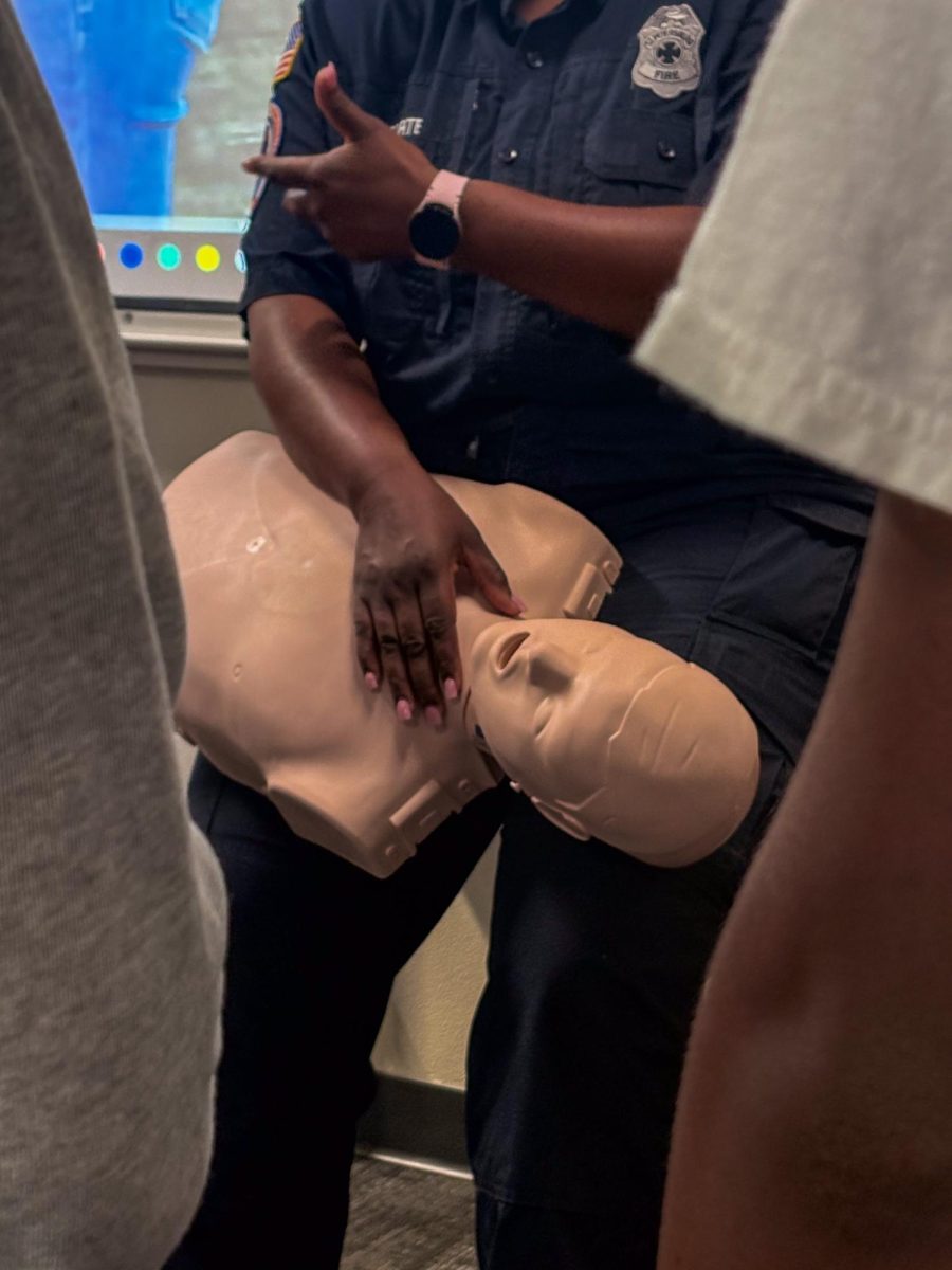D. Forte Giving intrustions on how to perform CPR to students in Ms. Milner's Classroom at Lakewood High School on Jan 23.