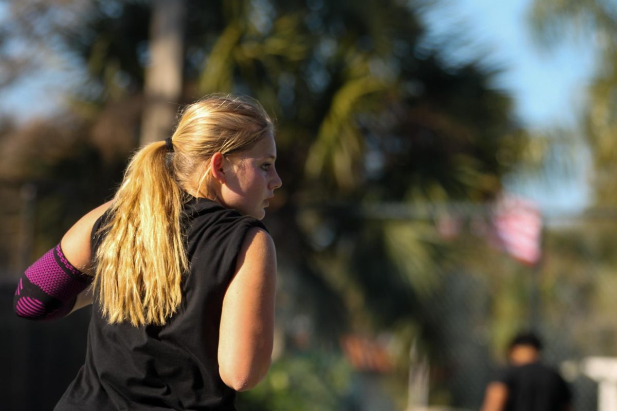 Junior Julia Fauer has a moment of silent determination during her match against an Osceola opponent at the Seminole Lake Family Center tennis courts on Feb 10.