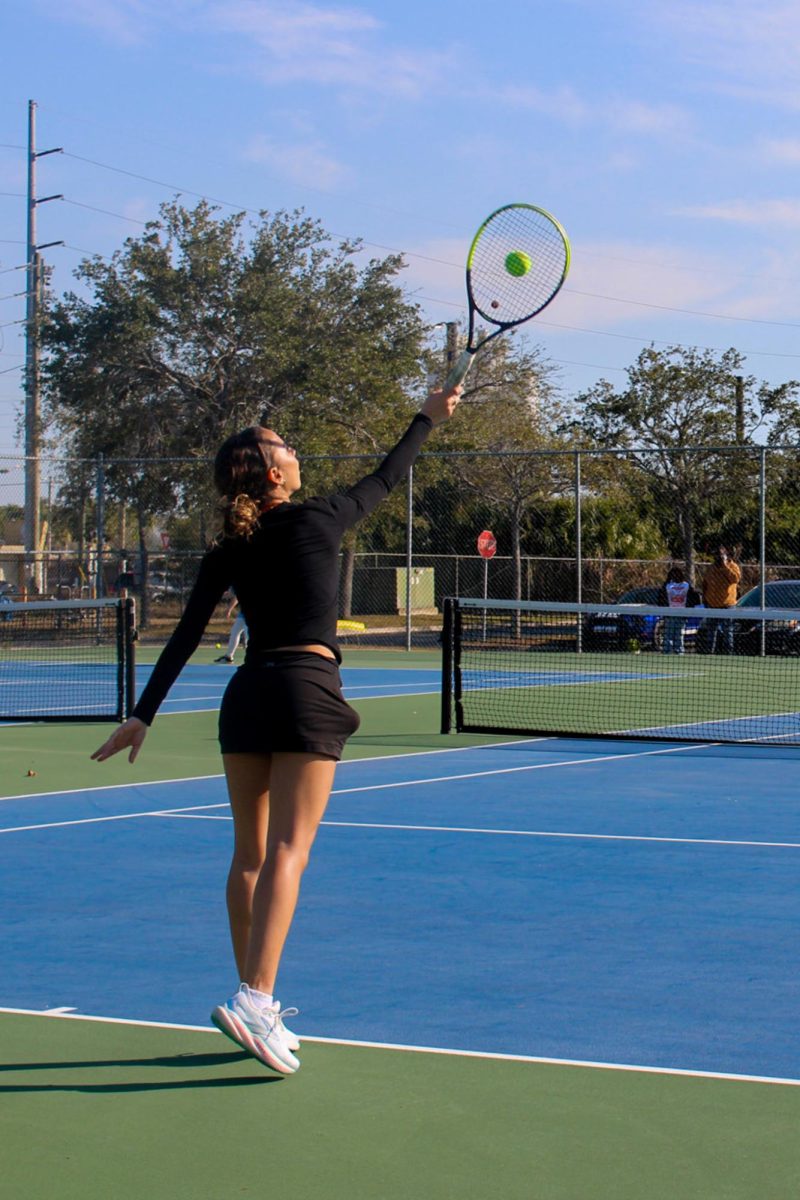 Senior Lelya Anasri faces a Gibbs opponent  at the Gibbs High School tennis courts on Tuesday, February 3.