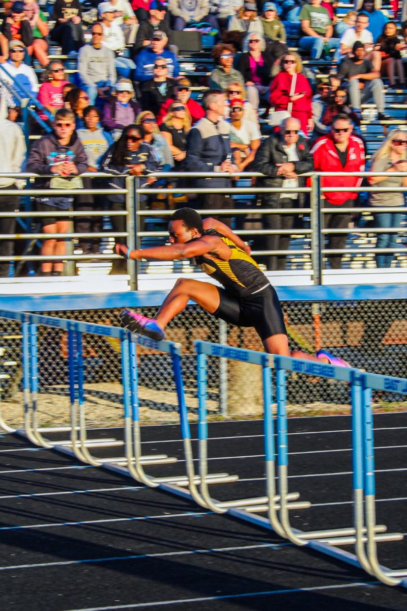 JuniorJoshua Maynor running in the 110 Hurdles and came in 1st place. The Spartan Track and Field team competed against other schools during the track meet at East Lake High School on Feb. 23.