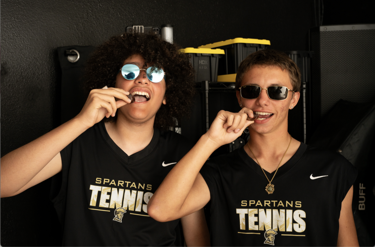 Juniors Abdallah El Kousy and Joel Burnsed break their fast with a date on Feb.20 durning the tennis team bonding photoshoot. "If someone else does it then I have to show up,"  El Kousy said. 