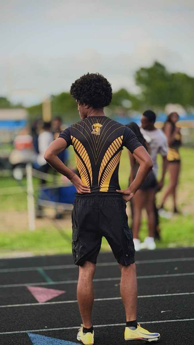 Sophomore Jessie Vanable standing on the track during the Track and Field meet with Gibbs at Lakewood High School on Wednesday, March 8.