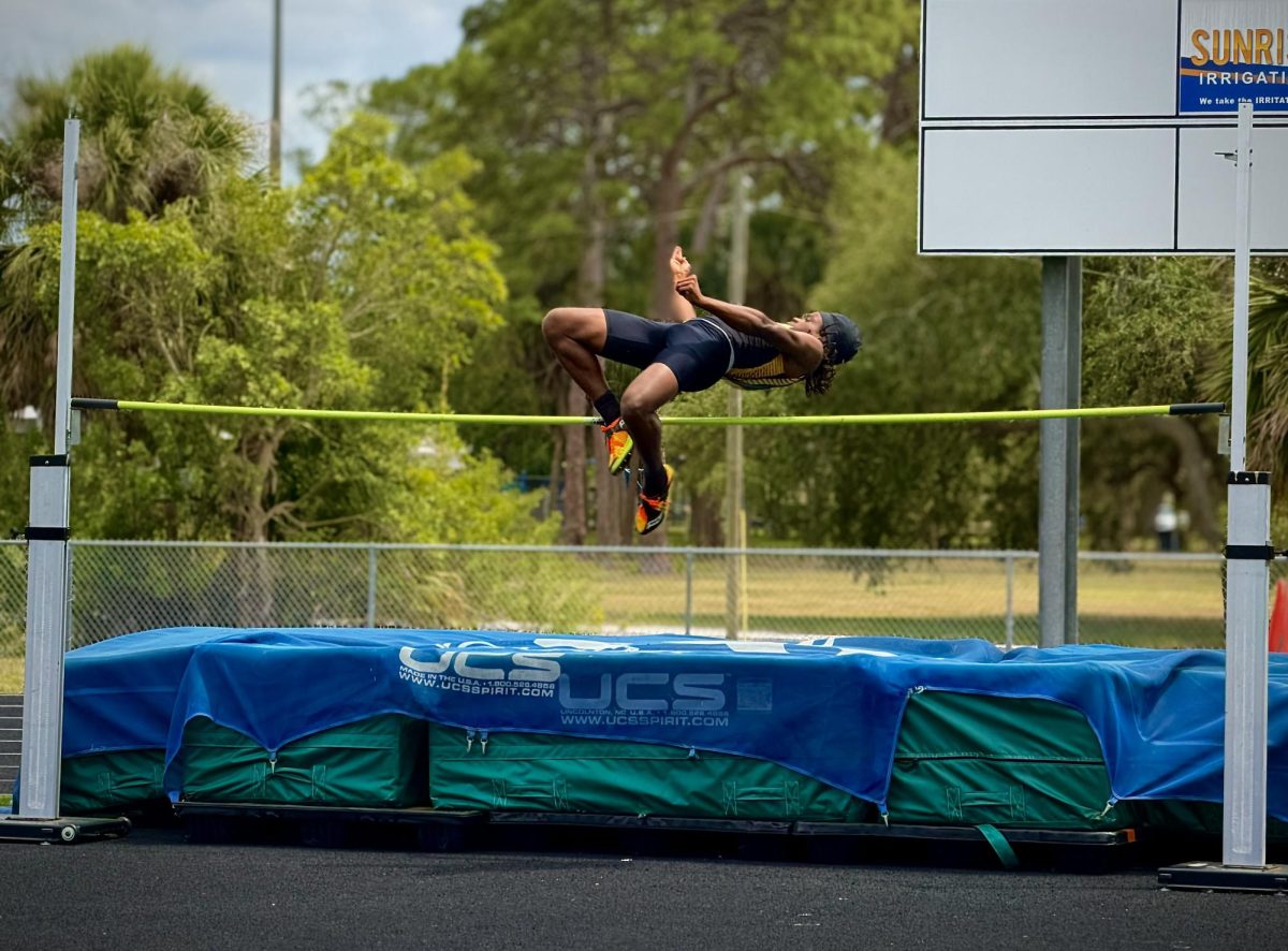 Senior Jameel Joseph competing in the high jump event during the District Track and Field meet at Lakewood High School's field on April 22.