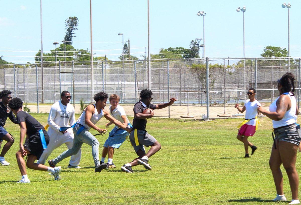 Seniors play flag football during the Senior Field Day on April 17th. "I enjoyed playing flag football with my fellow classmates," said Senior Joel Burnsed.